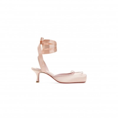 CHRISTIAN LOUBOUTIN CASSIA LACE UP PUMPS IN PINK 